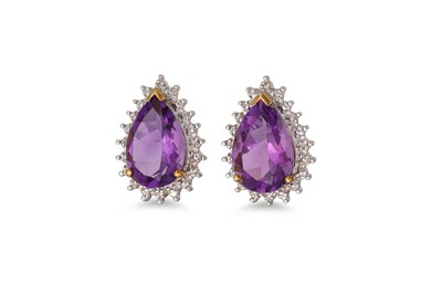 Lot 44 - A PAIR OF DIAMOND AND AMETHYST EARRINGS, the...