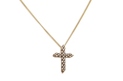 Lot 67 - A DIAMOND CROSS, mounted in gold on a chain....