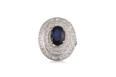 Lot 94 - A DIAMOND AND SAPPHIRE CLUSTER RING, the large...