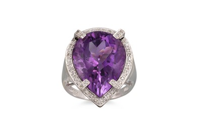 Lot 96 - AN AMETHYST AND DIAMOND RING, the large pear...