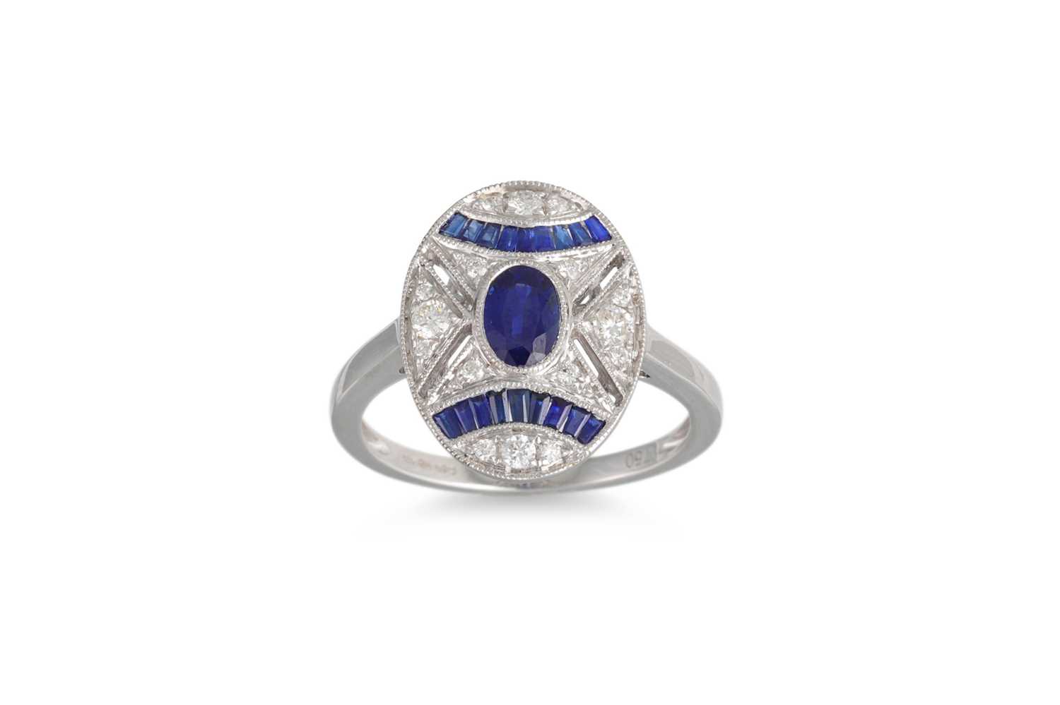 Lot 105 - A DIAMOND AND SAPPHIRE CLUSTER RING, of oval...