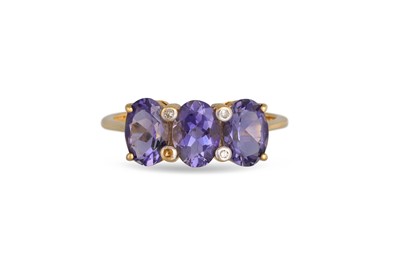Lot 114 - A DIAMOND AND TANZANITE RING, mounted in...