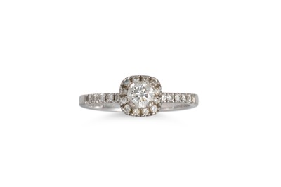 Lot 228 - A DIAMOND SOLITAIRE DRESS RING, the round...