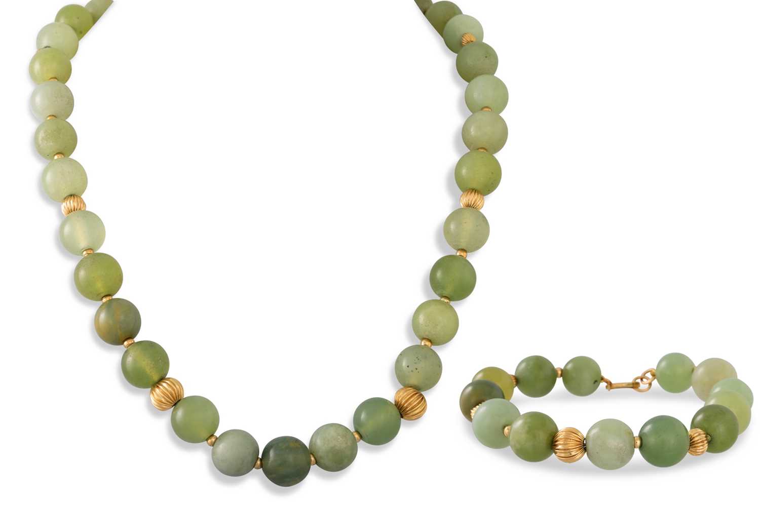 Lot 134 - A JADE BEADED NECKLACE, with a gold clasp and...