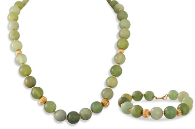 Lot 134 - A JADE BEADED NECKLACE, with a gold clasp and...