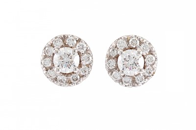 Lot 319 - A PAIR OF DIAMOND HALO CLUSTER EARRINGS, the...