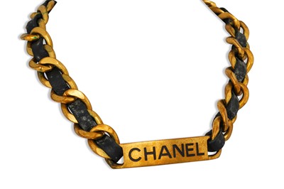 Lot 15 - A CHANEL LEATHER AND CHAIN CHOKER, central...