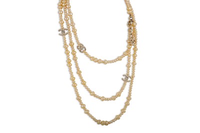 Lot 26 - A CHANEL FAUX PEARL NECKLACE, multi stranded...
