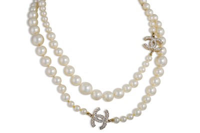 Lot 27 - A CHANEL FAUX PEARL NECKLACE, Double C spacers,...