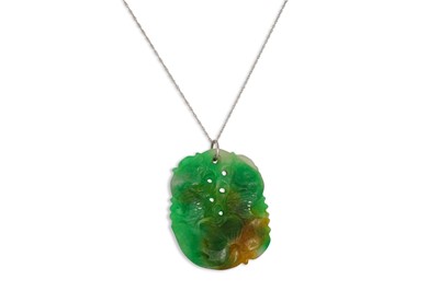 Lot 108 - A JADE CARVED PENDANT, on a white gold chain