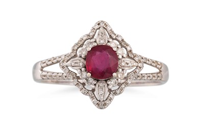 Lot 231 - A RUBY AND DIAMOND CLUSTER RING, of lozenge...