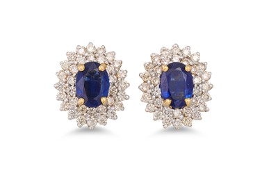 Lot 339 - A PAIR OF DIAMOND AND SAPPHIRE EARRINGS, oval...