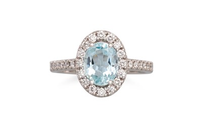 Lot 180 - AN AQUAMARINE AND DIAMOND CLUSTER RING, the...