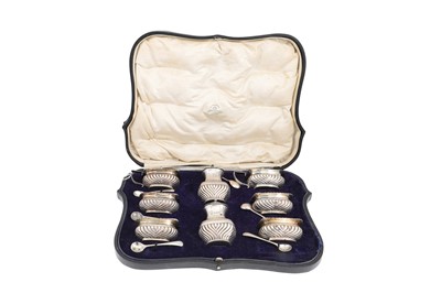 Lot 544 - A GEORGE V SILVER EIGHT-PIECE CONDIMENT SET,...