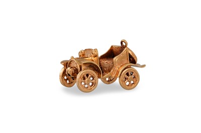 Lot 256 - A 9CT GOLD CHARM, in the form of a vintage car,...