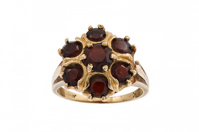 Lot 391 - A GARNET CLUSTER RING, mounted in 14ct gold,...