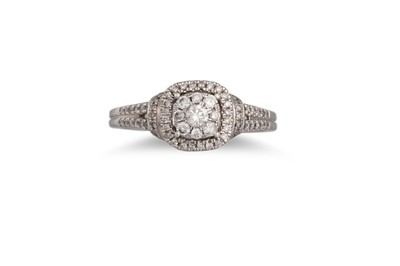 Lot 456 - A DIAMOND CLUSTER RING, mounted in 9ct white...