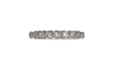 Lot 428 - A FULL BANDED ETERNITY RING, the round...