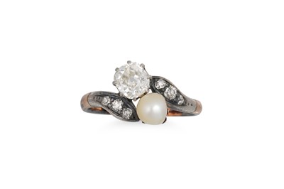 Lot 435 - AN ANTIQUE DIAMOND AND PEARL TOI ET MOI RING,...