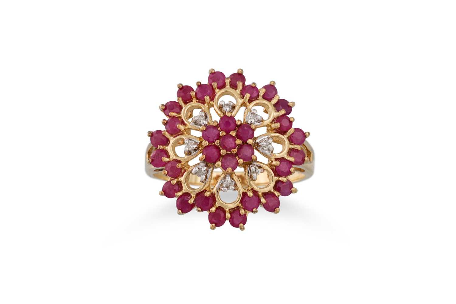 Lot 38 - A DIAMOND AND RUBY CLUSTER RING, of circular...