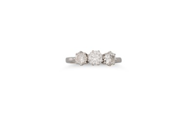 Lot 396 - A DIAMOND THREE STONE RING, the round...