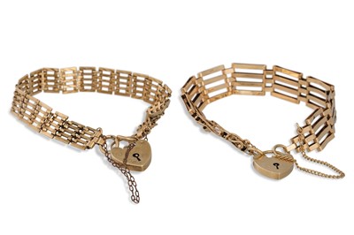 Lot 414 - TWO 9CT GOLD GATE BRACELETS, with safety chain...