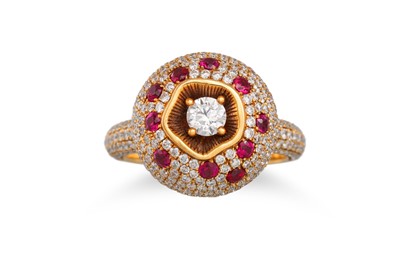 Lot 177 - A DIAMOND AND RUBY CLUSTER RING, the round...