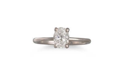 Lot 249 - A DIAMOND SOLITAIRE RING, the oval diamond...