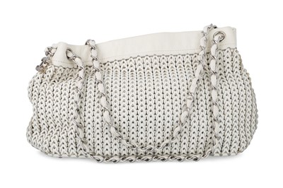 Lot 213 - A CHANEL WHITE LEATHER WOVEN SHOULDER BAG,...