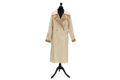 Lot 218 - A MAX MARA CREAM TRENCH COAT, belted, size 46