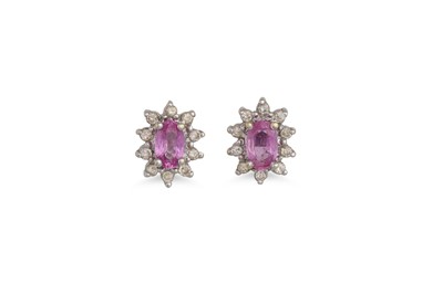 Lot 485 - A PAIR OF PINK SAPPHIRE AND DIAMOND CLUSTER...