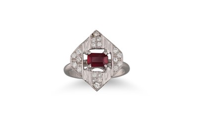Lot 351 - A DIAMOND AND RUBY CLUSTER RING, of plaque...