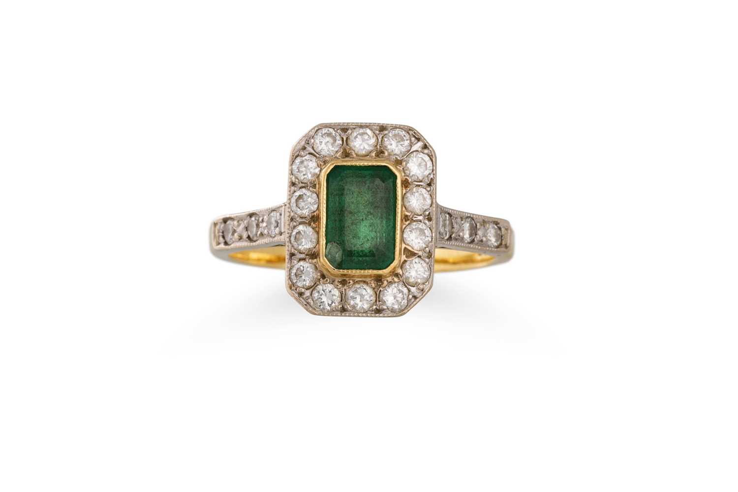Lot 61 - AN EMERALD AND DIAMOND CLUSTER RING, mounted...