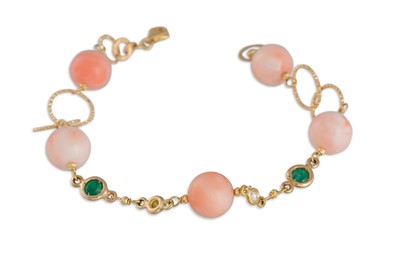 Lot 356 - A CORAL EMERALD AND DIAMOND BRACELET, mounted...
