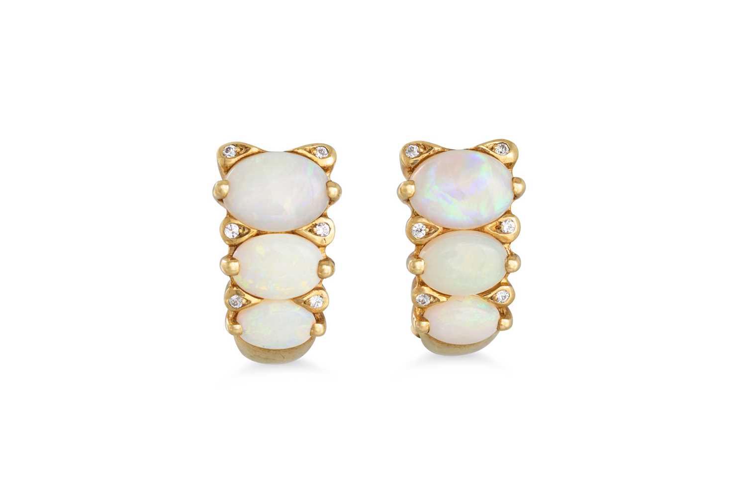 Lot 382 - A PAIR OF THREE STONE OPAL AND DIAMOND...
