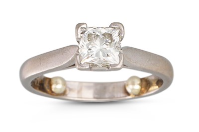 Lot 458 - A DIAMOND SOLITAIRE RING, the princess cut...