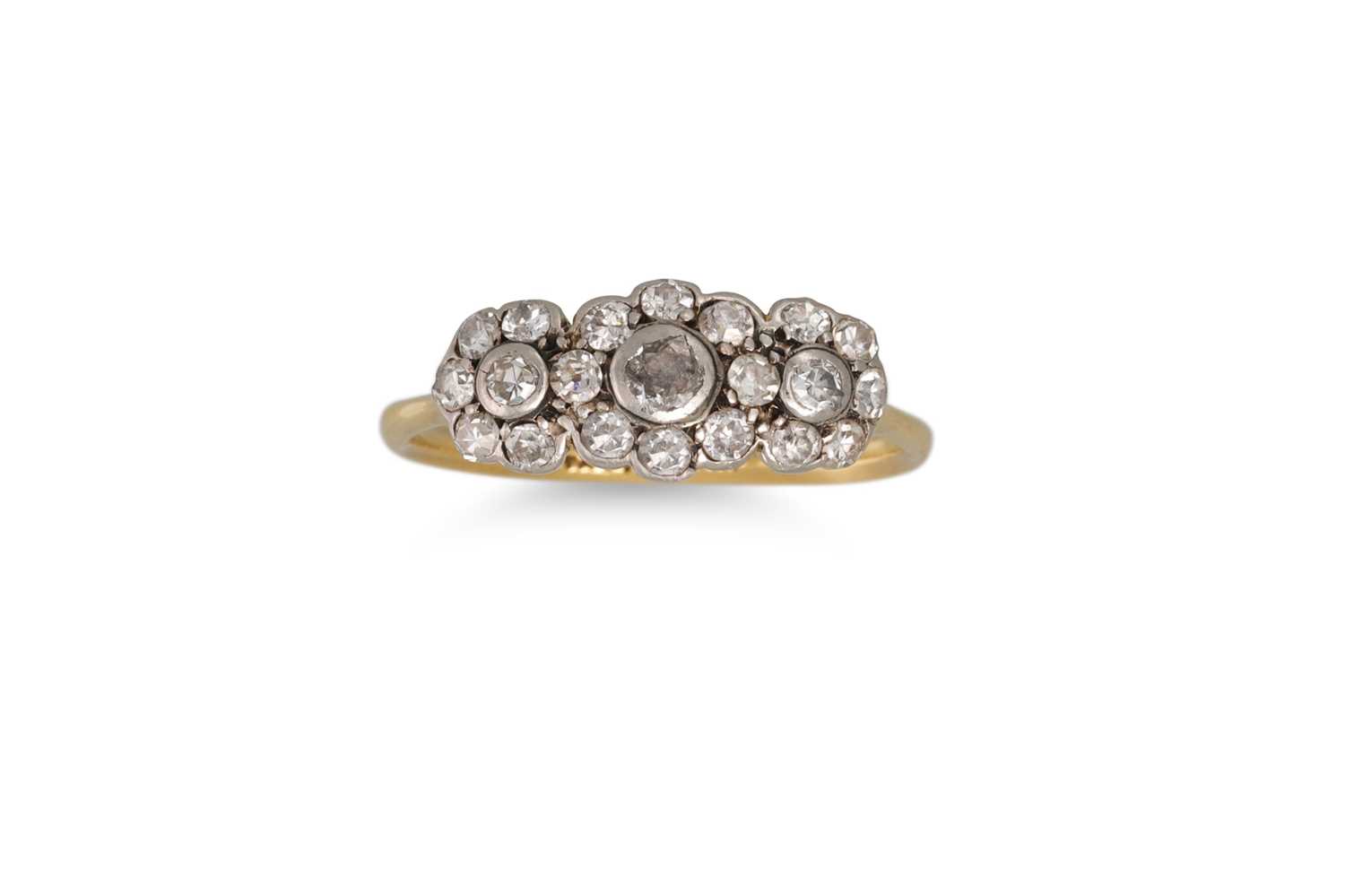 Lot 64 - A VINTAGE DIAMOND TRIPLE CLUSTER RING, mounted...