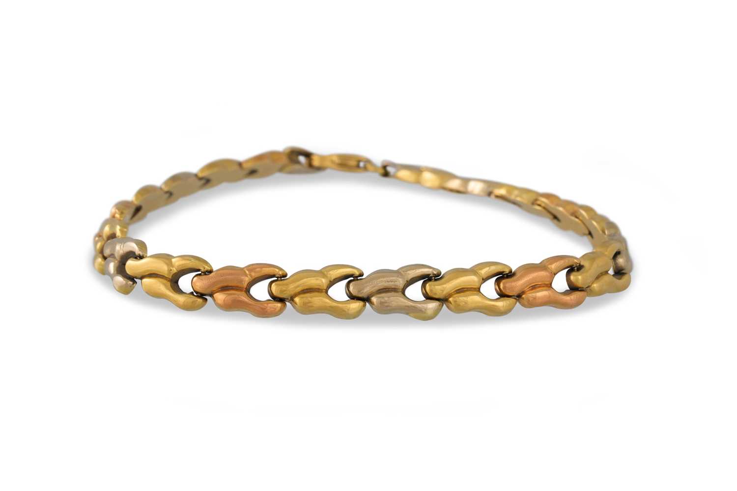 Lot 7 - AN 18CT THREE COLOUR GOLD BRACELET, signed...