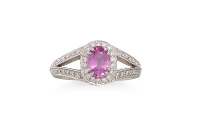 Lot 140 - A PINK SAPPHIRE AND DIAMOND CLUSTER RING,...