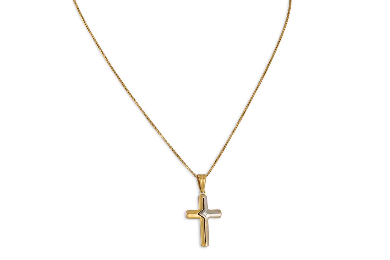 Lot 337 - AN 18CT GOLD CROSS ON A CHAIN, set with a...