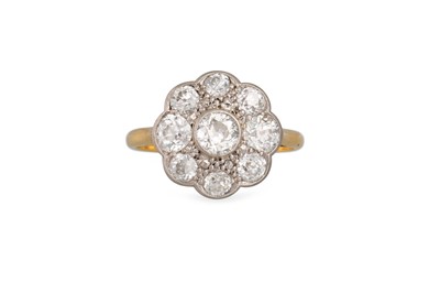 Lot 184 - A VINTAGE DIAMOND 'DAISY' CLUSTER RING, the...