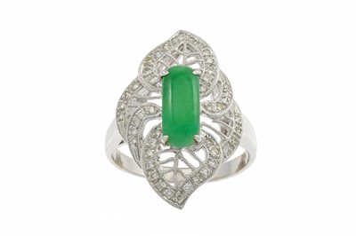 Lot 386 - A JADEITE AND DIAMOND CLUSTER RING, of...