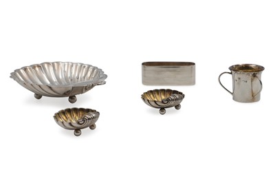 Lot 557 - A SILVER SCALLOP SHAPED BUTTER DISH, together...