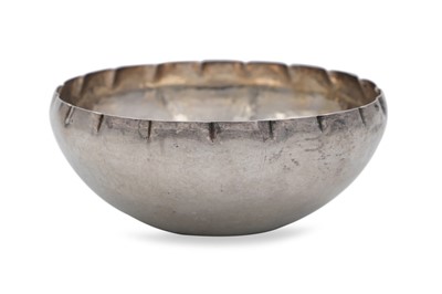 Lot 561 - A MODERN WHITE METAL BOWL WITH HAMMERED FINISH,...