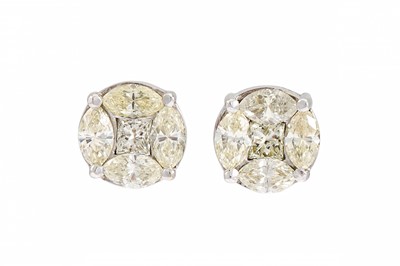Lot 59 - A PAIR OF DIAMOND CLUSTER EARRINGS, set with...