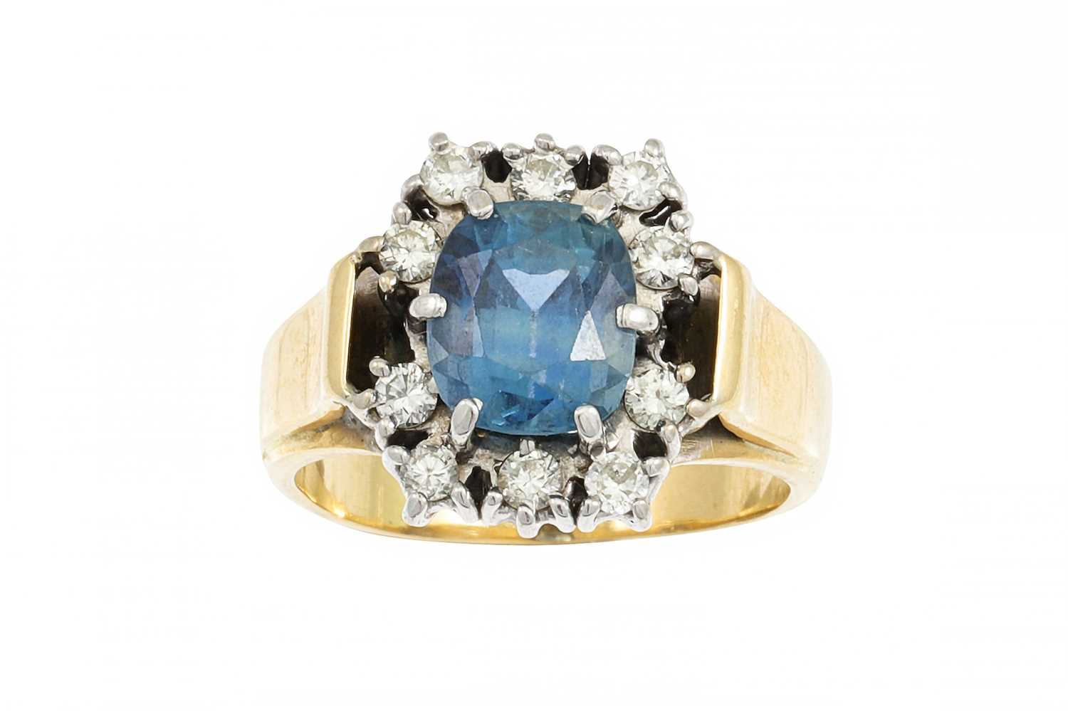 Lot 184 - A SAPPHIRE AND DIAMOND CLUSTER RING, mounted...