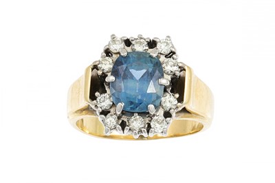 Lot 381 - A SAPPHIRE AND DIAMOND CLUSTER RING, mounted...