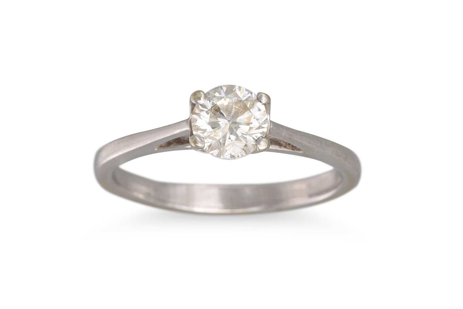 Lot 12 - A DIAMOND SOLITAIRE RING, mounted in white...