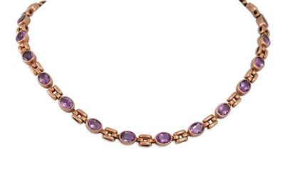 Lot 288 - AN AMETHYST SET NECKLACE, the oval amethyst...