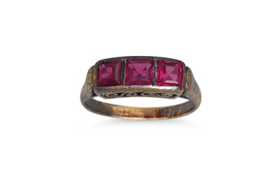 Lot 134 - A VINTAGE RUBY RING, the French cut stones in...